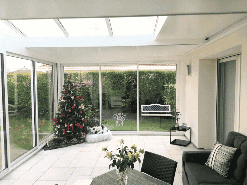 Intérieur de véranda décoré, réalisation d'Aluminium Habitat à Pau