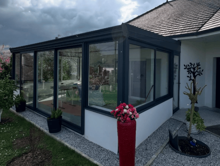 Réalisation d’une Véranda « ALUMINIUM HABITAT » Menuiseries en aluminium à rupture de pont thermique totale à Pau